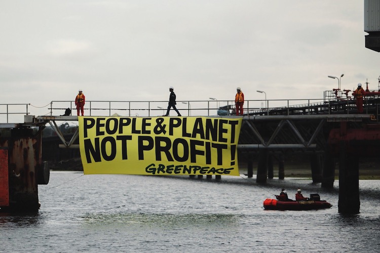 BP and Shell get called ‘Climate Criminals’ at the Oil and Money conference